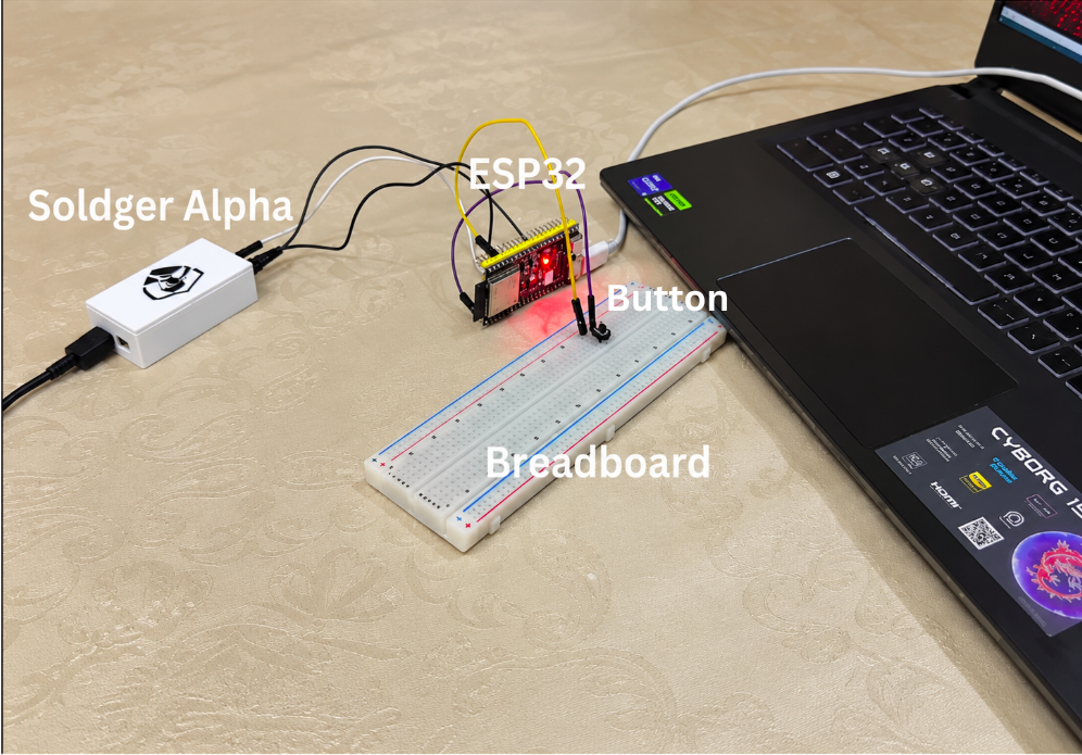 Actual prototype wiring with Soldger, ESP32, button, and breadboard